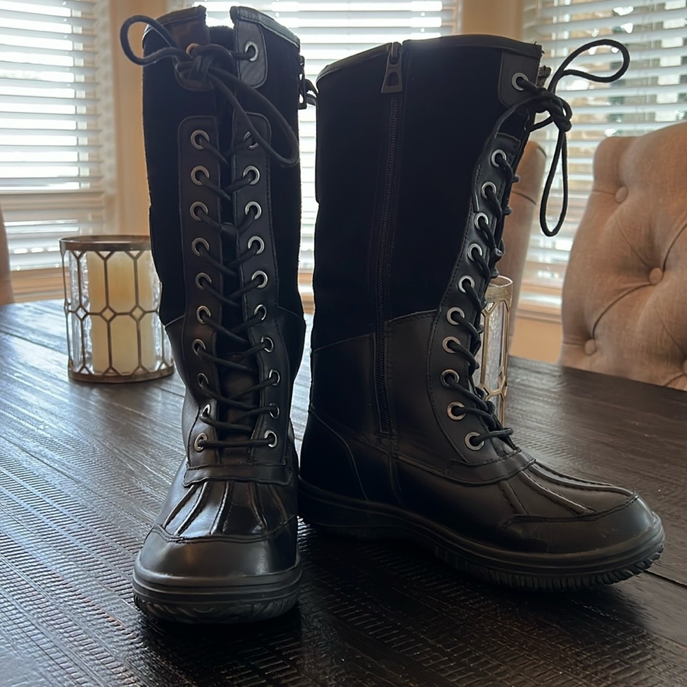 Women’s tall Rudsak boots.